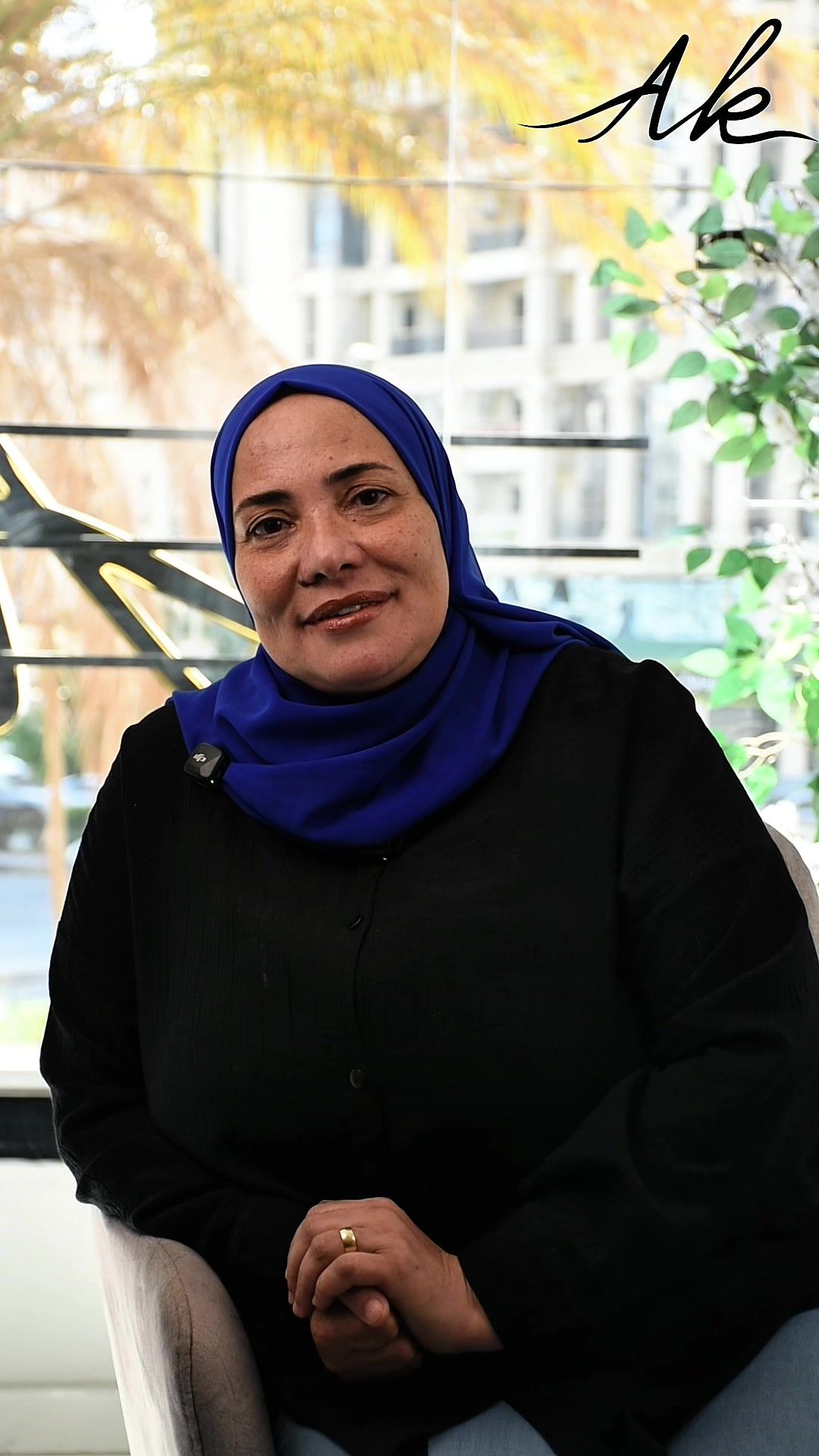 Samah seated inside AK Dental Clinics